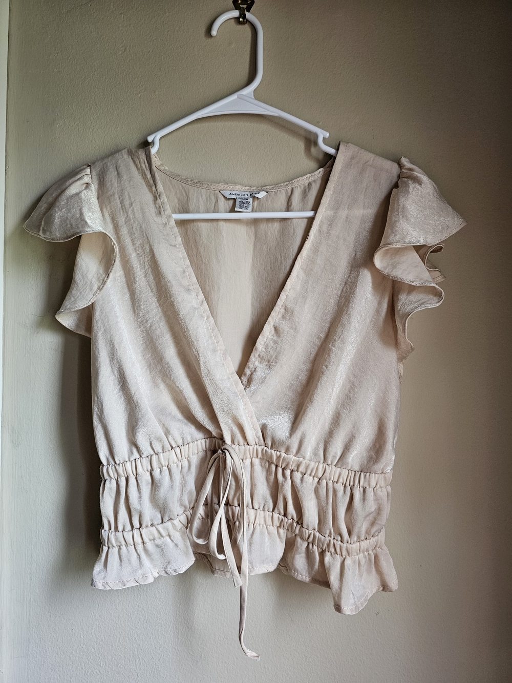 Cream Ruffle-Sleeve Blouse with Drawstring Waist